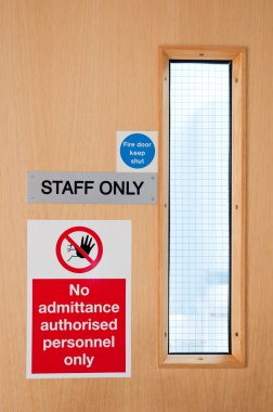 Staff only signs at laboratory clipart