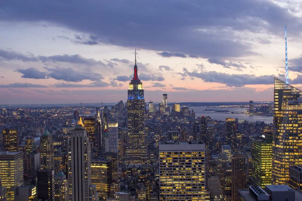 Solnedgång över new york city — Stockfoto
