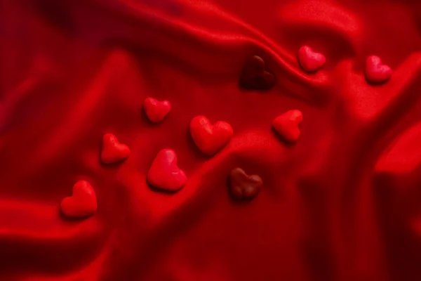 Plastelíny srdce na hedvábné pozadí — Stock fotografie