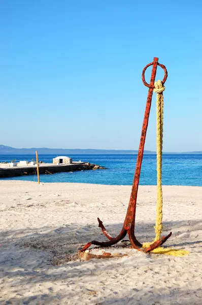 stock image Anchor on the beach and turquoise water at the modern luxury hot