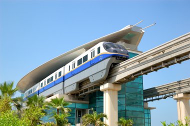 The Palm Jumeirah monorail station and train, Dubai, United Arab clipart