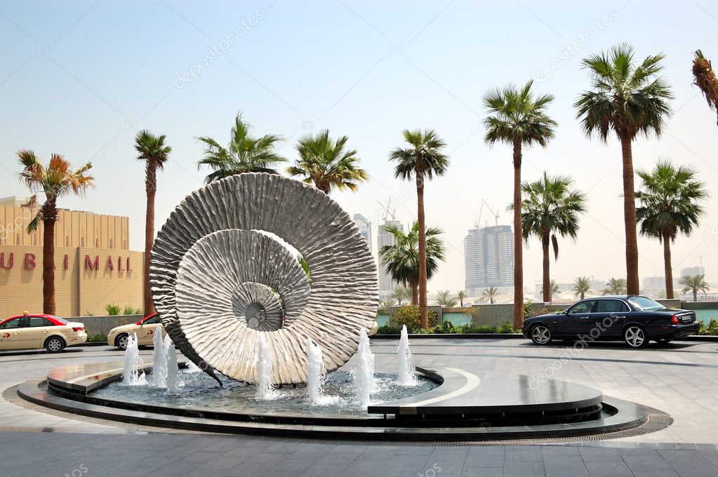 DUBAI, UAE - AUGUST 27: The fountains and waiting area of the Ad