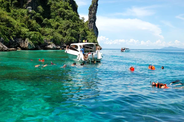 stock image KOH PHI PHI, THAILAND - SEPTEMBER 13: Snorkeling tourists on tur