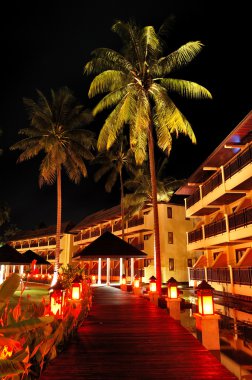 Illuminated relaxation area of luxury hotel, Koh Chang island, clipart