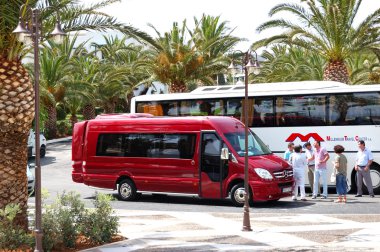 CRETE ISLAND, GREECE - MAY 13: The modern bus for tourists trans clipart