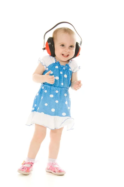 Das kleine Mädchen mit dem Kopfhörer — Stockfoto