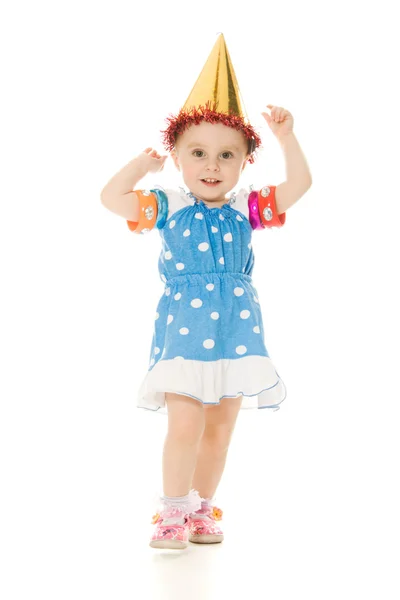 Malá holčička v klobouku je tanec — Stock fotografie