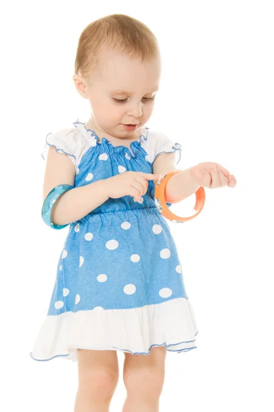 Little girl with bracelets on their hands — Stock Photo, Image