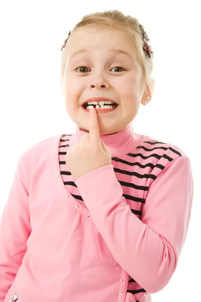 De cerca Retrato de una linda niña mostrando sus dientes perdidos —  Fotos de Stock