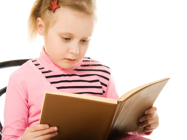 Маленька дівчинка з книгою — стокове фото