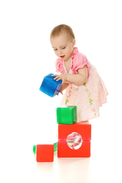 Baby playing with colourful blocks Royalty Free Stock Images