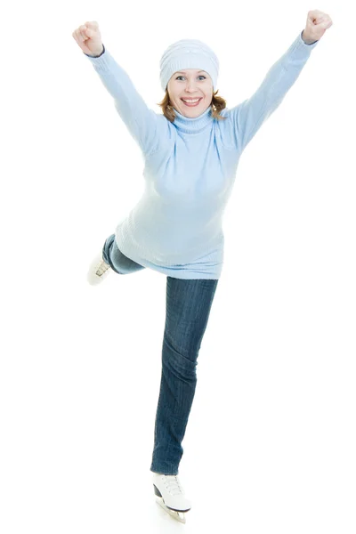 En flicka med skridskor på vit bakgrund. — Stockfoto