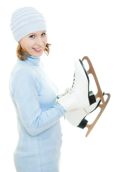 Женщина с коньками на белом фоне . — стоковое фото