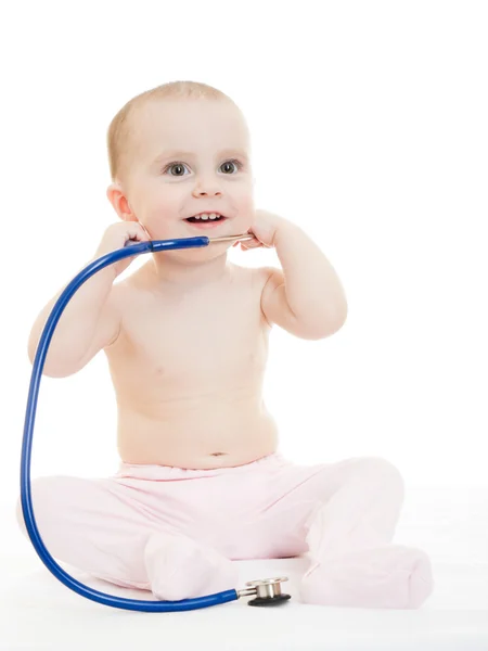 Happy baby with stethoscope on white background. — Stock Photo, Image