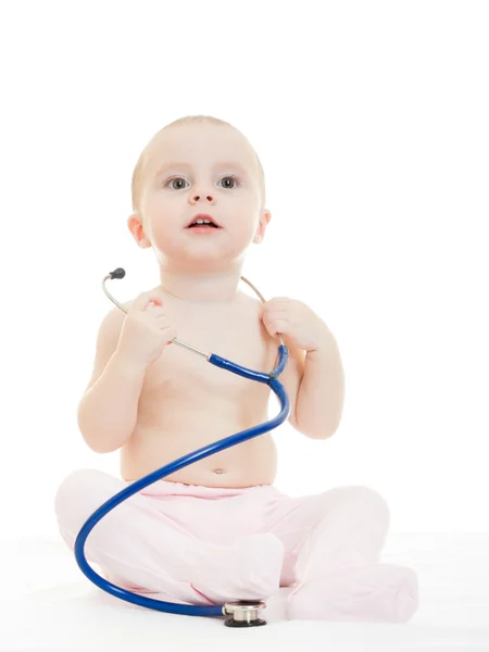 Gelukkig baby met stethoscoop op witte achtergrond. — Stockfoto