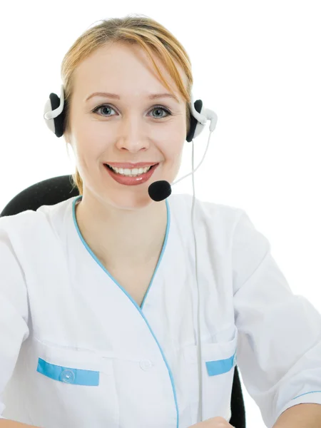 Uma mulher médico operador em um fundo branco . — Fotografia de Stock