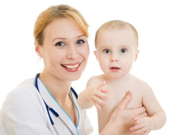 Arts houden een baby in haar armen op een witte achtergrond. Stockafbeelding