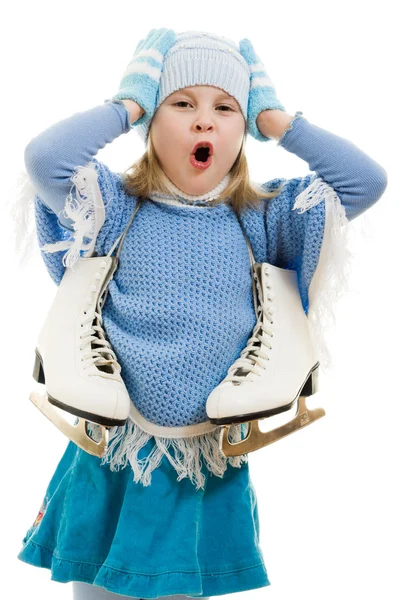Uma menina com patins no fundo branco . — Fotografia de Stock