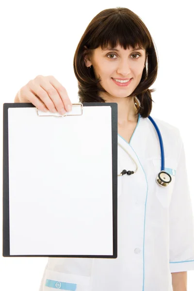 Mulher médico com um tablet de publicidade em um fundo branco . — Fotografia de Stock