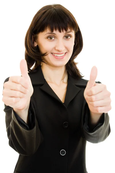 Крупный план улыбающейся деловой женщины, показывающей большие пальцы в изоляции — стоковое фото
