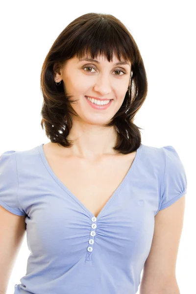 Een vrouw in een blauw shirt en witte rok op een witte achtergrond. — Stockfoto
