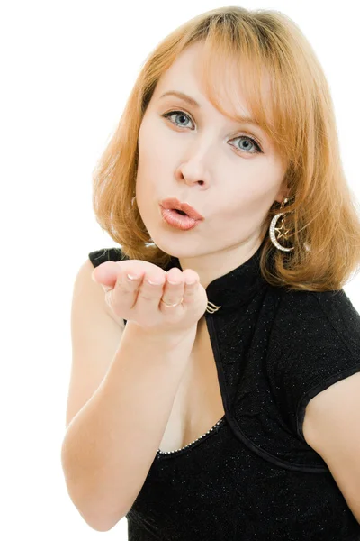 Beautiful young woman puckering up for a kiss — Stock Photo, Image