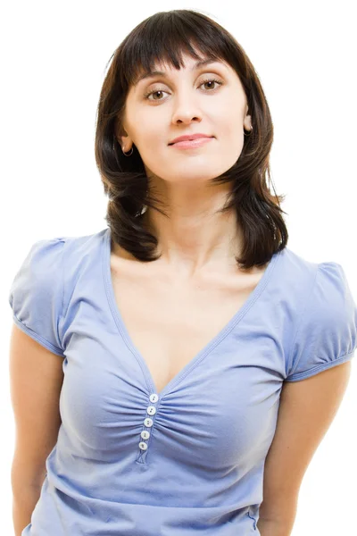 Uma mulher em uma camisa azul e saia branca em um fundo branco . — Fotografia de Stock