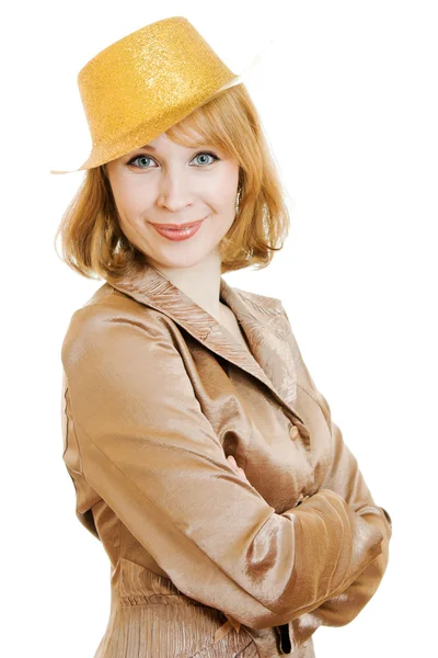 Business woman in a festive gold hat on a white background. — Stock Photo, Image