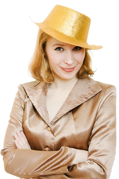 Zakenvrouw in een feestelijke goud hoed op een witte achtergrond. — Stockfoto