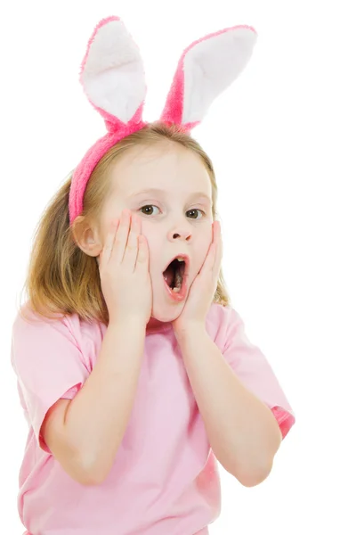 小女孩用白色背景上的粉红耳朵兔子. — 图库照片