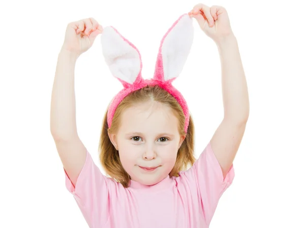 Маленькая девочка с розовыми ушами кролик на белом фоне . — стоковое фото