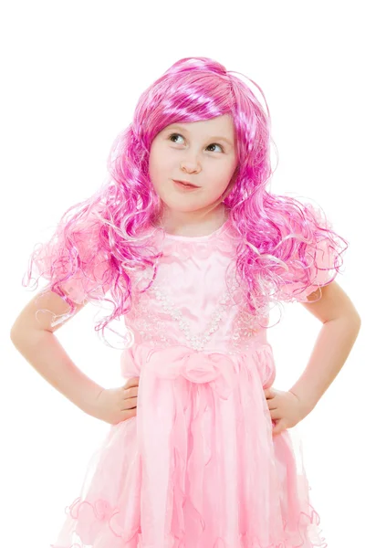 Ein Mädchen mit rosa Haaren in einem rosa Kleid auf weißem Hintergrund. — Stockfoto