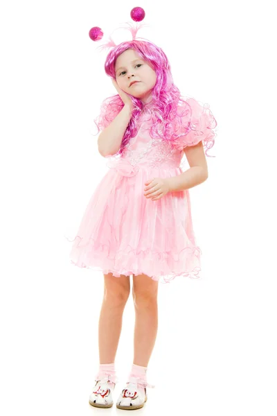 Een meisje met roze haren in een roze jurk op een witte achtergrond. — Stockfoto