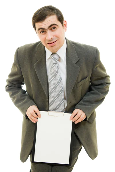 Un hombre de negocios con una hoja blanca en blanco sobre un fondo blanco . — Foto de Stock