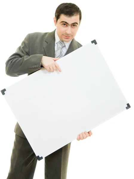 Un uomo d'affari con una lavagna bianca su sfondo bianco . — Foto Stock