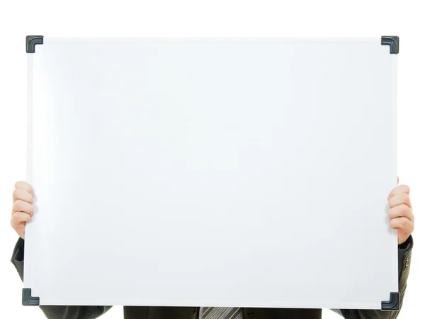Uomo d'affari coperto il viso con una tavola bianca su uno sfondo bianco . — Foto Stock