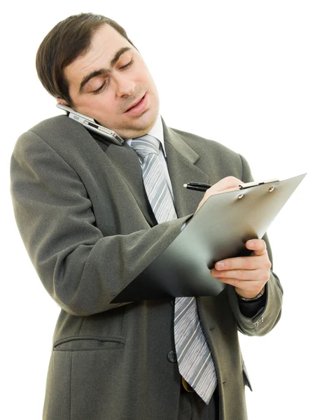 Empresário escrevendo na caneta tablet em um fundo branco . — Fotografia de Stock