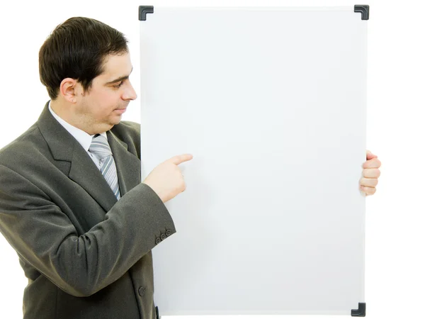 A businessman with a white board on a white background. — Stock Photo, Image