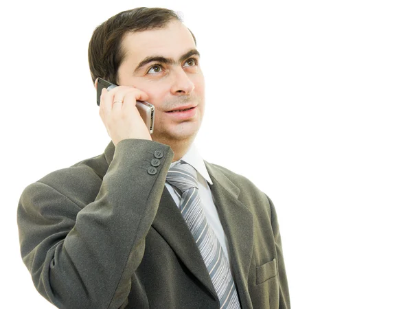 Homme d'affaires parlant au téléphone sur un fond blanc . — Photo