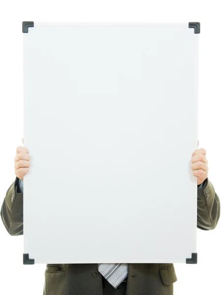 Podnikatel zakryl tvář s bílou tabuli na bílém pozadí. — Stock fotografie