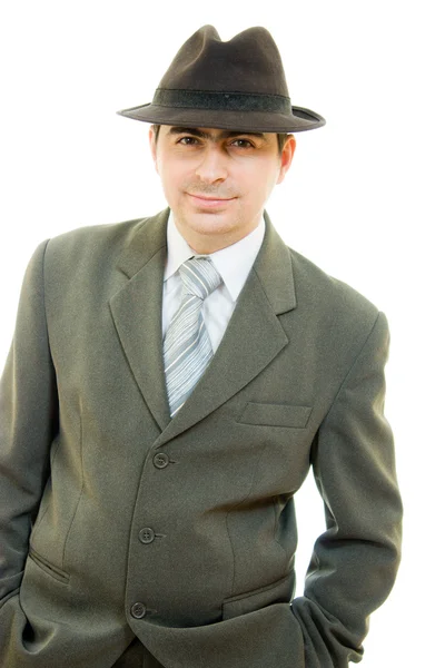 Um homem de negócios de chapéu sobre um fundo branco . — Fotografia de Stock