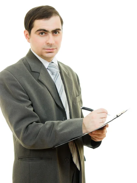 ビジネスマン、白い背景にタブレット ペンで書く. ロイヤリティフリーのストック画像