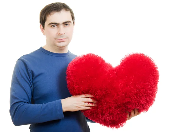 A man holding a big red heart on a white background. — Stock Photo, Image