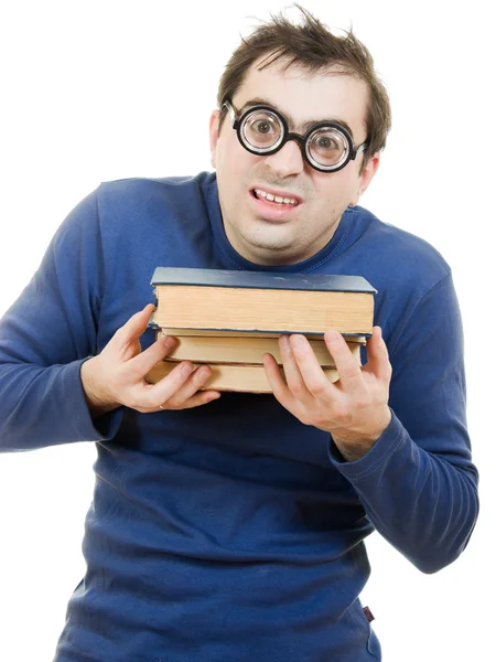 Studente in occhiali con un libro sopra la testa su sfondo bianco — Foto Stock