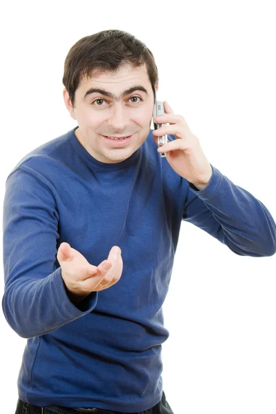 Retrato joven hablando por teléfono celular sobre un fondo blanco — Foto de Stock