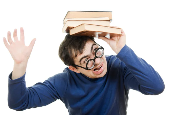 Étudiante en lunettes avec un livre sur la tête sur fond blanc — Photo