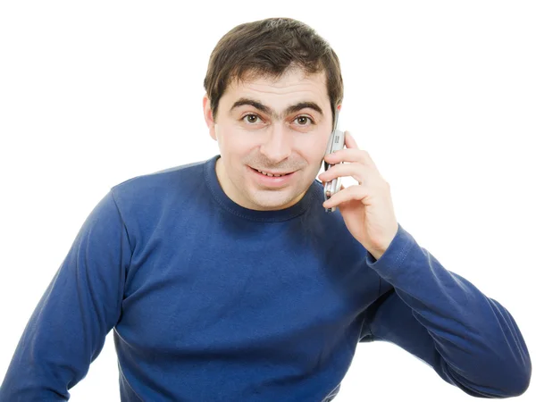Portré fiatal férfi fehér háttéren mobiltelefonon beszél — Stock Fotó