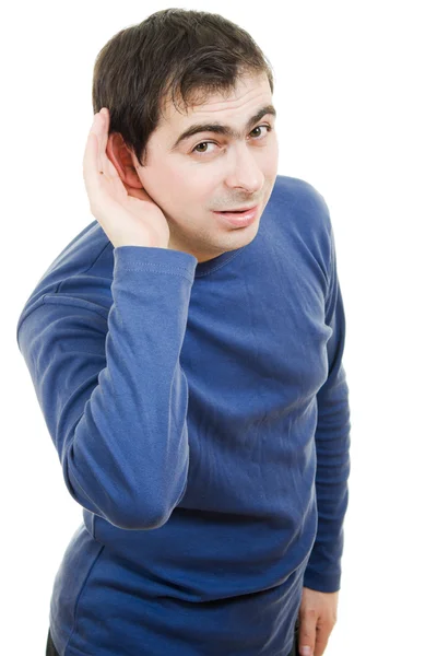 stock image Portrait of young man listening gossip on white background.