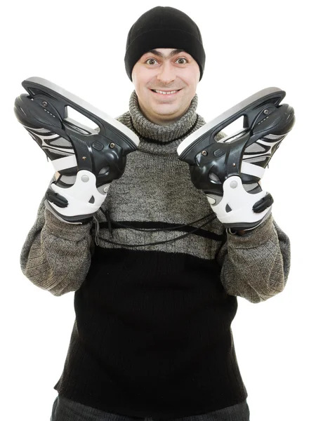 Man met schaatsen op witte achtergrond. — Stockfoto