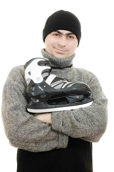 Mannen met schaatsen op witte achtergrond — Stockfoto